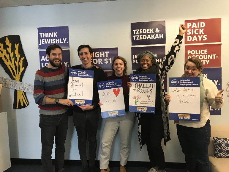 JUFJ team members pose with smiling faces after successfully unionizing